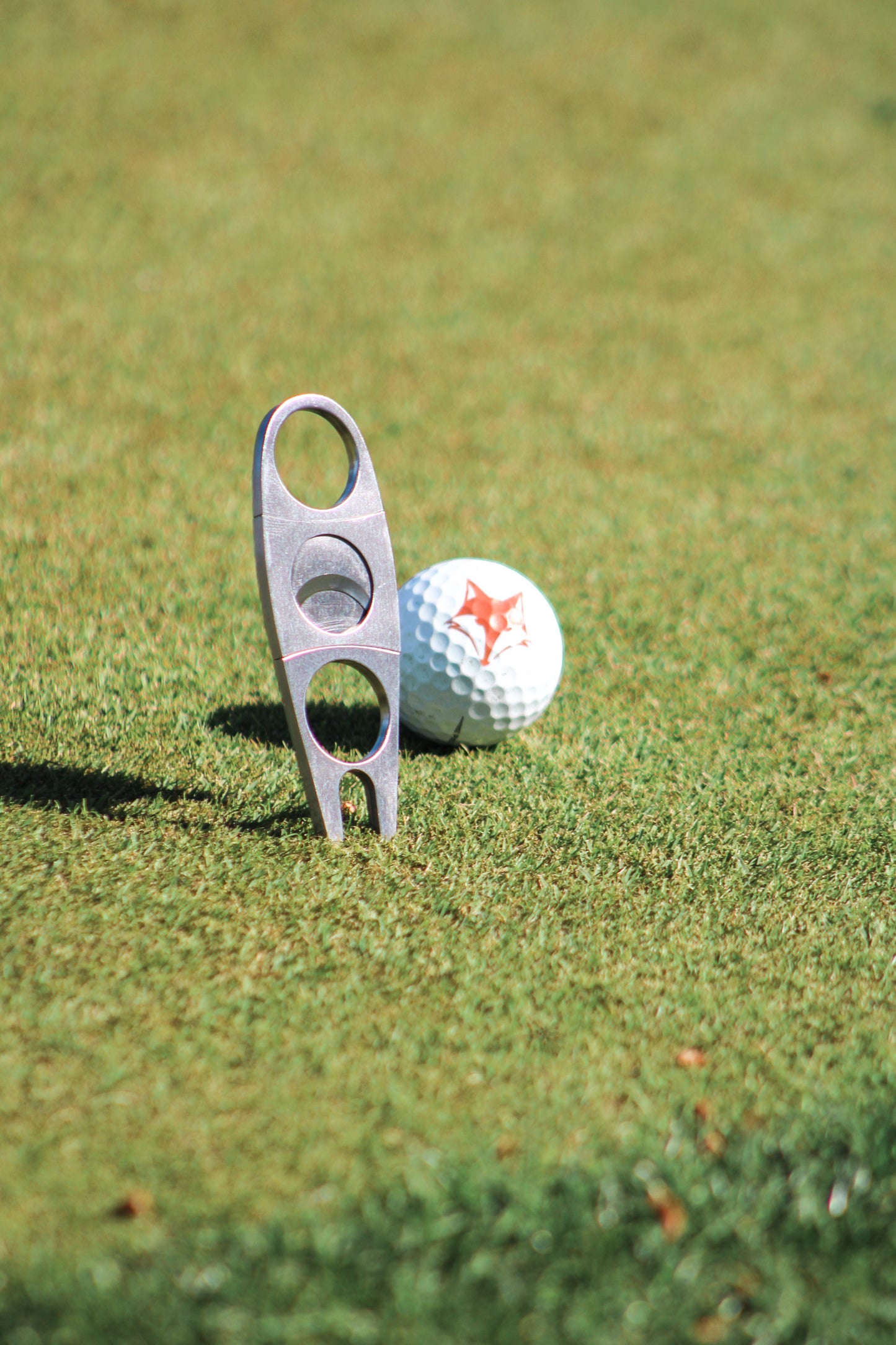 Cigar Cutter + Divot Repair Tool